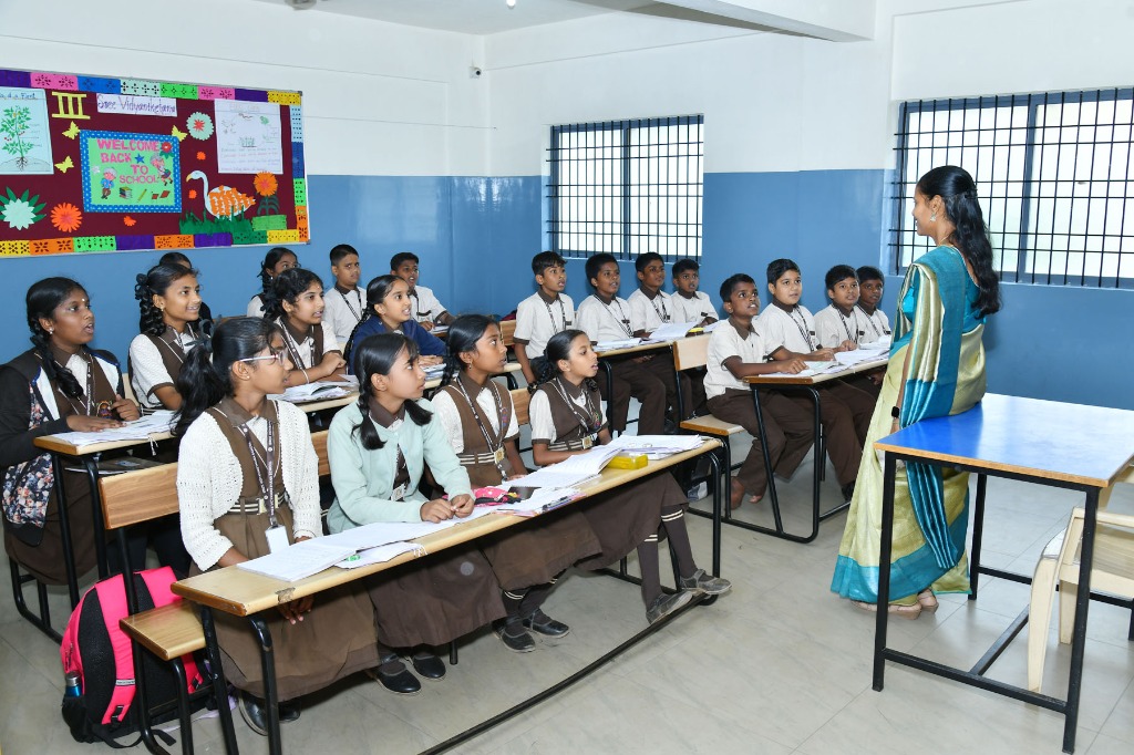High school students learning in study session inside classroom