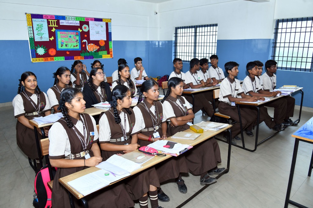 Primary students focused on study session inside classroom