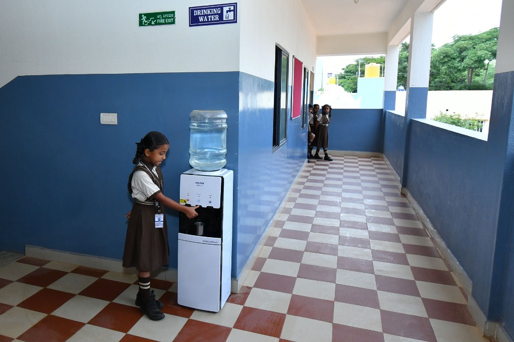 Drinking water cooler system inside school corridor