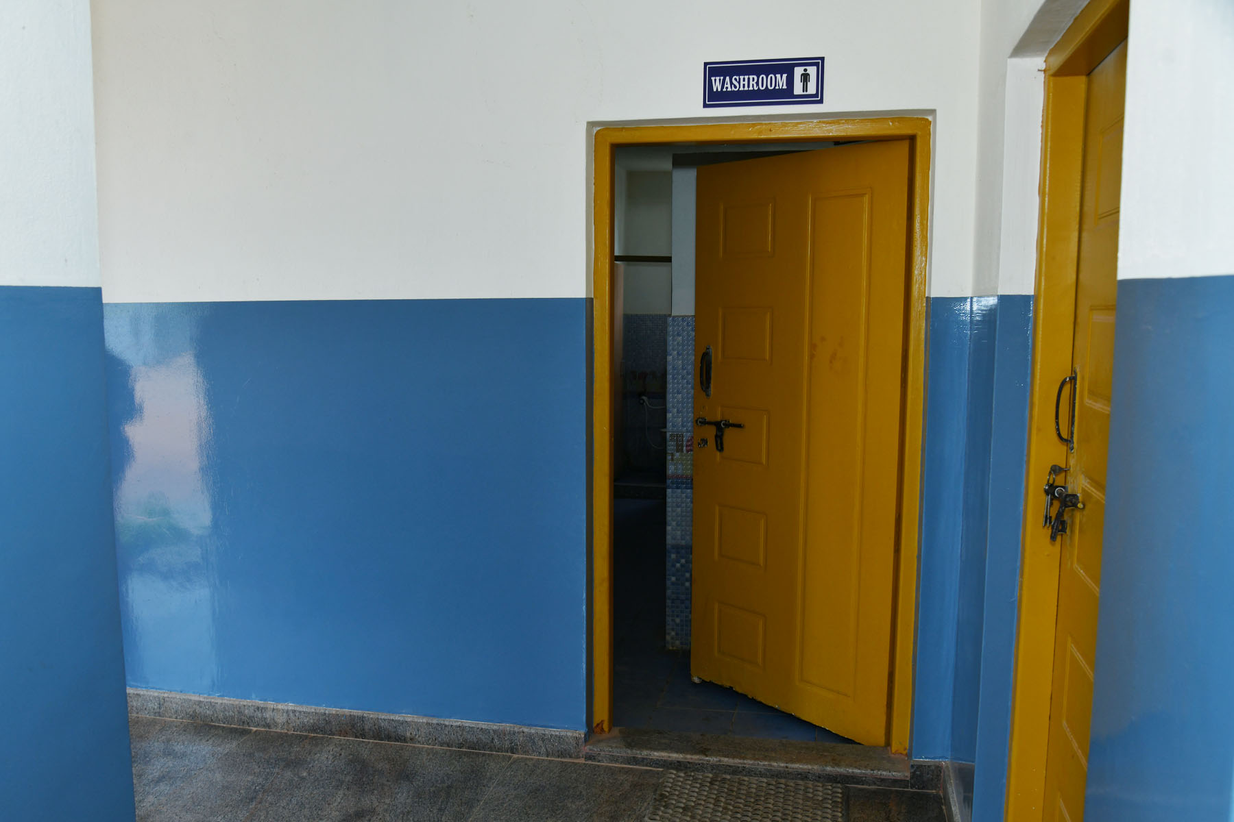 Disabled-friendly CWSN girl's toilet facility with access ramps outside