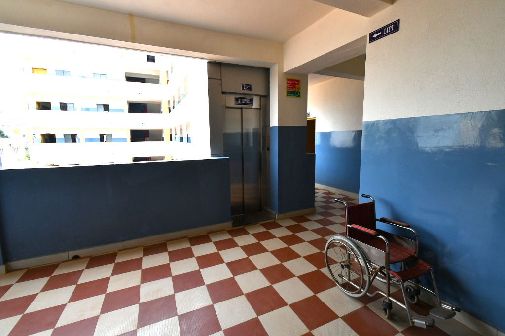 School elevator corridor with wheelchair support facilities
